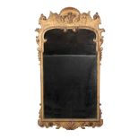 A GEORGE I GILTWOOD AND GILT-GESSO GIRANDOLE MIRROR