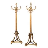 A PAIR OF REGENCY BLACK AND GILT-JAPANNED TORCHERES