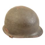 AN AMERICAN MILITARY HELMET,