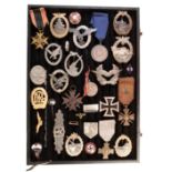 A COLLECTION OF GERMAN BADGES AND MEDALS