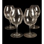 SET OF FOUR LATE VICTORIAN OVERSIZE WINE GLASSES