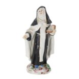 A BOW PORCELAIN FIGURE OF A NUN