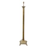 A BRASS COLUMNAR STANDARD LAMP