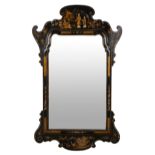 A GEORGE I STYLE BLACK LACQUERED CHINOISERIE MIRROR