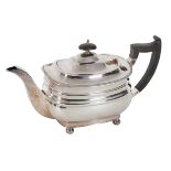 A SILVER TEAPOT