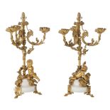 A PAIR OF 19TH FRENCH ORMOLU AND WHITE MARBLE THREE BRANCH CANDELABRA