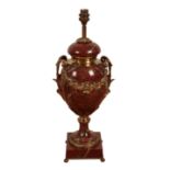 A LOUIS XV STYLE ORMOLU-MOUNTED ROUGE GRIOTTE LAMP,