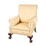 A MAHOGANY WING ARMCHAIR OF EARLY GEORGE II DESIGN