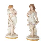 A PAIR OF ROYAL WORCESTER PORCELAIN FIGURES