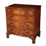 A GEORGE III STYLE MAHOGANY SERPENTINE CHEST OF DRAWERS
