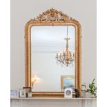 A LARGE GILTWOOD AND COMPOSITION OVERMANTLE MIRROR