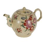 A CREAMWARE TEAPOT AND COVER