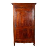 A FRENCH PROVINCIAL CHESTNUT ARMOIRE