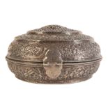 A FINE SINO TIBETAN REPOUSSE SILVER CIRCULAR INCENSE-BOX AND HINGED COVER