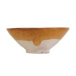 A CHINESE BUFF STONEWARE CONICAL BOWL
