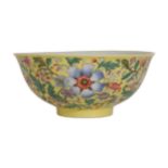 A CHINESE FAMILLE ROSE YELLOW-GROUND BOWL