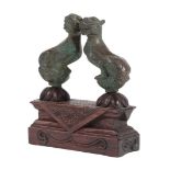 A PAIR OF CHINESE MINIATURE BRONZE SEATED LIONS