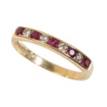 A RUBY AND DIAMOND HALF ETERNITY RING