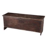 AN OAK SIX PLANK COFFER