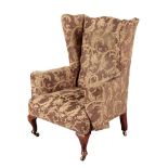 A VICTORIAN WING ARMCHAIR