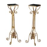 A PAIR OF GILT METAL AND MARBLE TOPPED TORCHERE