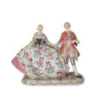 AN EARLY 20TH CENTURY SITZENDORF PORCELAIN FIGURE OF A DUKE AND DUCHESS