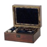 A ROSEWOOD AND BRASS MOUNTED DRESSING BOX