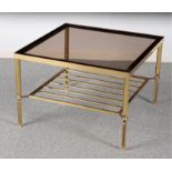 A CONTEMPORARY GILT METAL AND SMOKED GLASS COFFEE TABLE