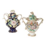 TWO EARLY 19TH CENTURY FLORAL ENCRUSTED PORCELAIN POT POURRI VASES AND COVERS