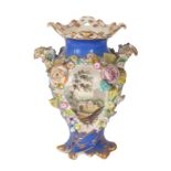 AN EARLY 19TH CENTURY ENGLISH FLORAL ENCRUSTED PORCELAIN TWO HANDLED URN