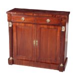 AN EMPIRE STYLE MAHOGANY AND GILT METAL MOUNTED SIDE CABINET