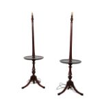 A PAIR OF MAHOGANY STANDARD LAMPS