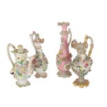 AN EARLY 19TH CENTURY ENGLISH FLORAL ENCRUSTED PORCELAIN MINIATURE WATERING CAN
