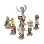 A SET OF SEVEN AELTESTE VOLKSTEDTER PORCELAIN 'MONKEY BAND' FIGURES