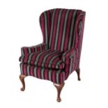 A GEORGE I STYLE WING ARMCHAIR