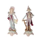 A PAIR OF ROYAL DUX PORCELAIN FIGURES