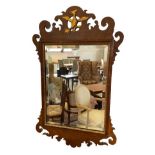 A GEORGE I STYLE MAHOGANY AND PARCEL-GILT MIRROR