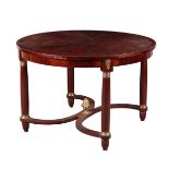 AN ITALIAN FIGURED MAHOGANY AND BRASS MOUNTED CIRCULAR CENTRE TABLE OF EMPIRE STYLE