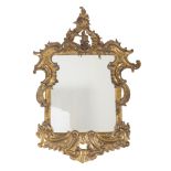 A GEORGE II STYLE GILT-METAL MIRROR