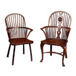 AN EARLY 19TH CENTURY ASH AND ELM 'PRIMITIVE' COMB BACK WINDSOR ARMCHAIR