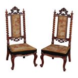 A PAIR OF VICTORIAN WALNUT AND NEEDLEWORK NURSING CHAIRS