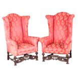 A PAIR OF WILLIAM AND MARY STYLE WALNUT WING ARMCHAIRS