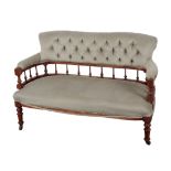 A VICTORIAN CHILD'S WALNUT TWO SEAT SETTEE