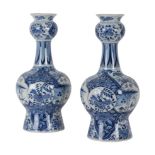A PAIR OF DELFT BLUE AND WHITE VASES