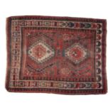 AN ANTIQUE KAZAK FACHRALO RUG