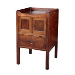 A MAHOGANY TRAYTOP COMMODE OF GEORGIAN STYLE