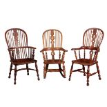 A 19TH CENTURY YEW WOOD, ASH AND ELM WINDSOR ARMCHAIR