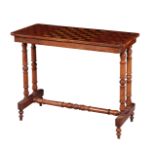 A VICTORIAN WALNUT GAMES TABLE