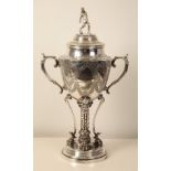 A LARGE AND IMPRESSIVE SILVER PLATED TROPHY