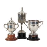 A SILVER GOLFING TROPHY CUP AND COVER